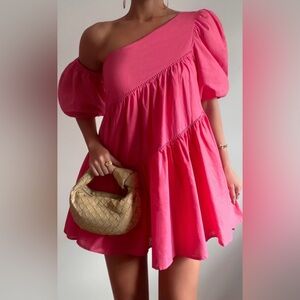 SHOWPO: HARLEEN MINI DRESS - LINEN LOOK ASYMMETRICAL TRIM PUFF SLEEVE IN PINK
